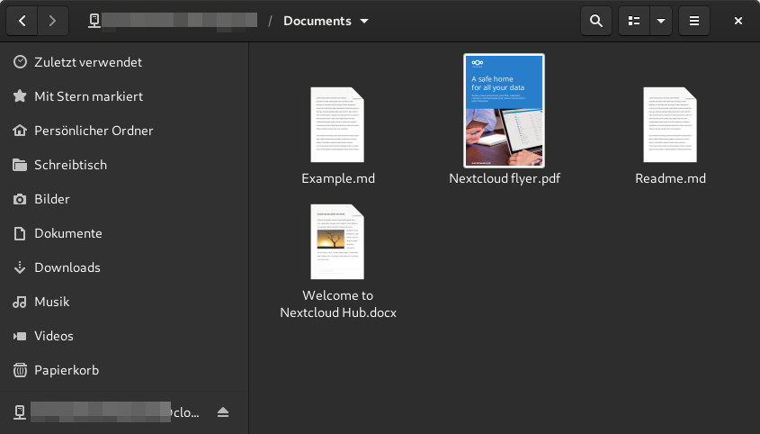 Anzeige von Nextcloud-Dateien im Gnome-Dateimanager. Weiße Schrift auf dunkelgrauem Hintergrund.