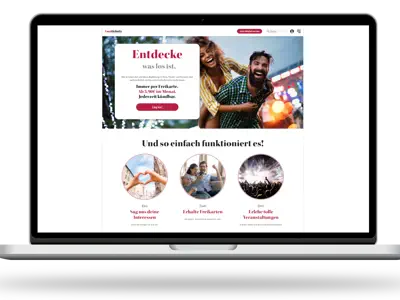 Die Website von Twotickets auf dem Monitor eines Notebooks.