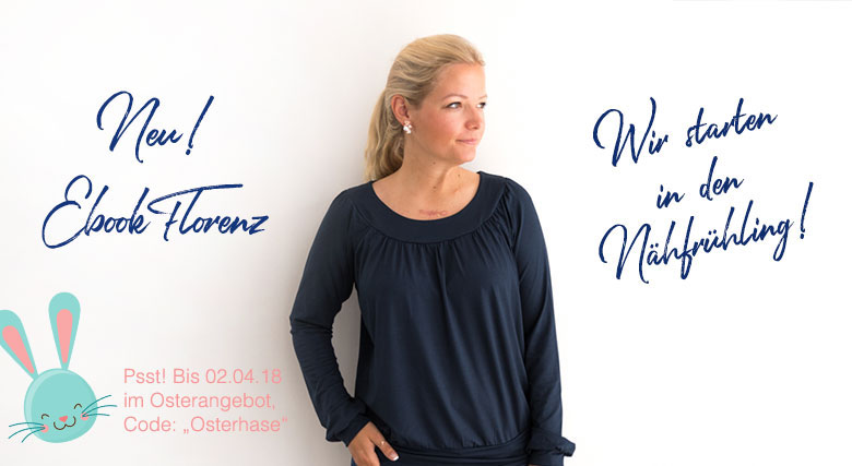 Blonde Frau in einer dunkelblauen Bluse. Sie schaut leicht lächelnd nach rechts auf den Schriftzug: Wir starten in den Nähfrühling!
